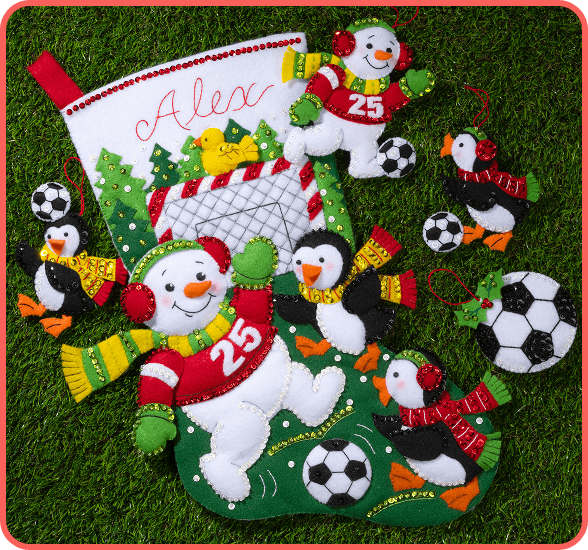 Felt stocking on snowman and penguins playing soccer with felt soccer ornaments